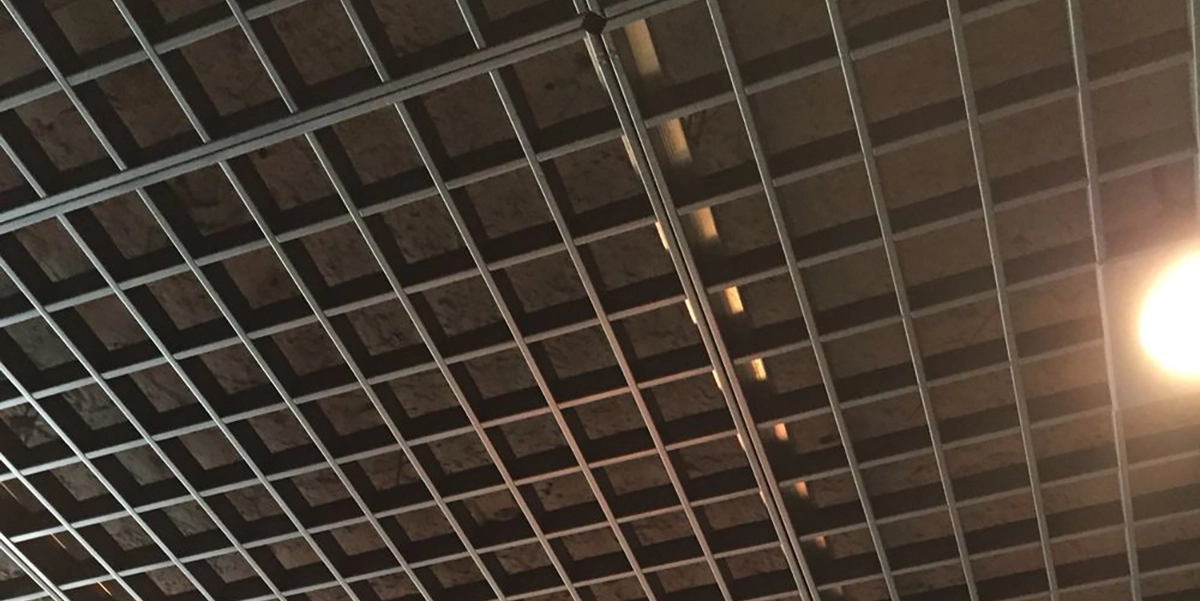 Close-up of cell ceiling grid available in multiple colours