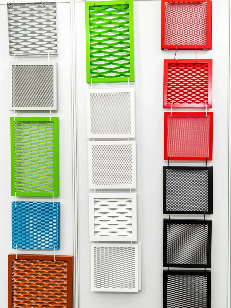 Samples of aluminium expanded mesh panels in multiple colours