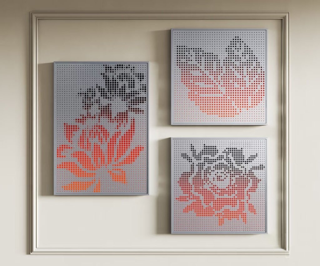 Floral-pattern perforated aluminium panels in red and black tones, installed as decorative wall art in a modern interior setting.