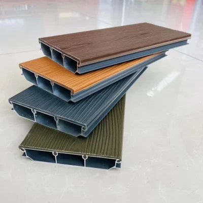 Stack up of outdoor composite floor panels in multiple colours