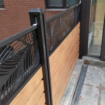 Details of installed slot fencing match with leaf-shape carving panel