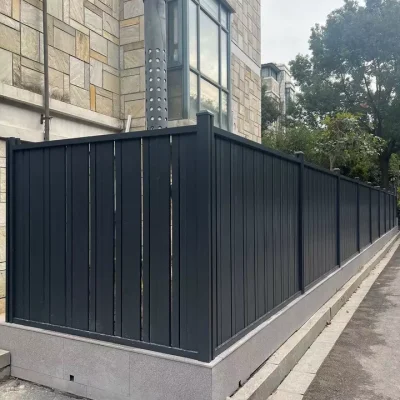 Vertical modular fencing with weathering finish installed in private yard