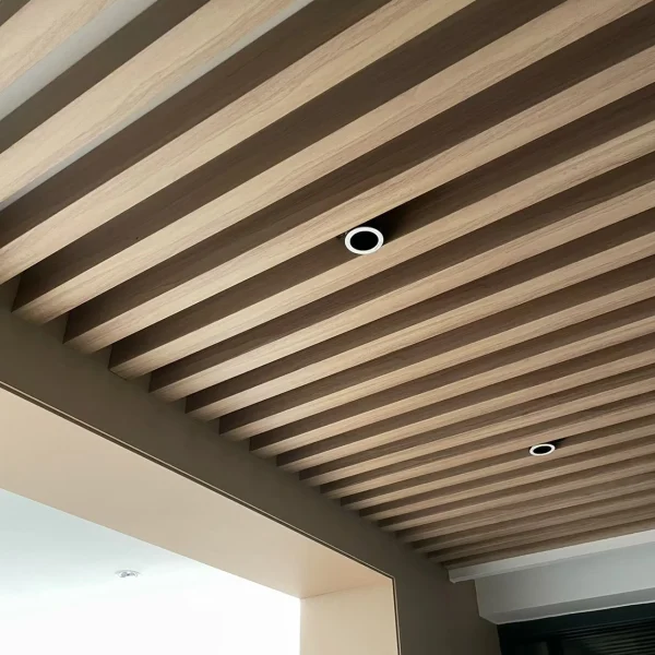 Close up of installed baffle ceiling in wood grain