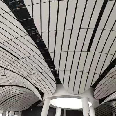 Close-up of installed aluminium panel with white colour as curved ceiling