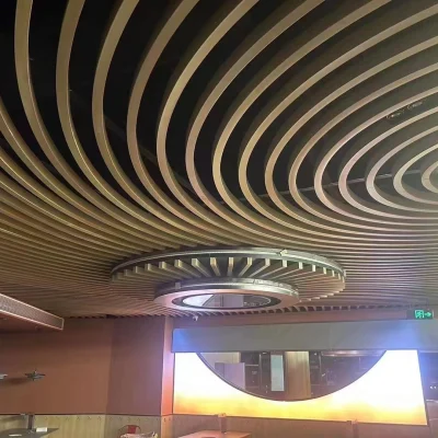 Aluminum baffle ceiling in curved shape installed in mall space