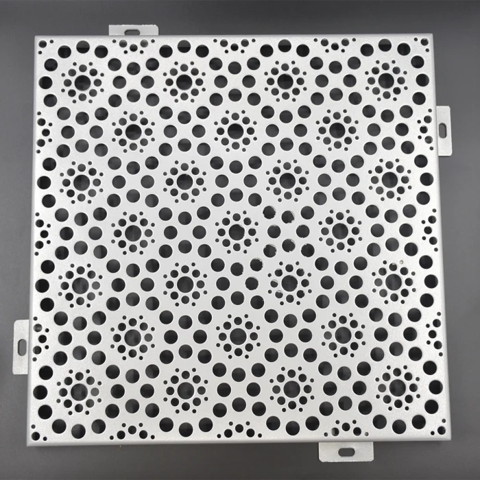 Aluminium perforated panel in array of multiple sizes of holes