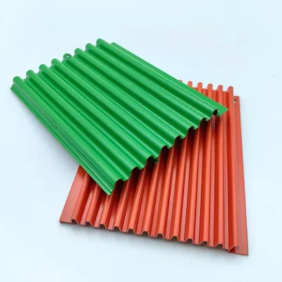 Close up of wave panels by aluminium 6063-T5 in green and red finishes
